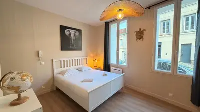 Un ou plusieurs lits dans un hébergement de l'établissement Refuge des intimes - Spa & Sauna en Cave