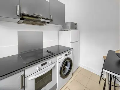 Cuisine ou kitchenette dans l'établissement Superbe appartement au centre de POISSY