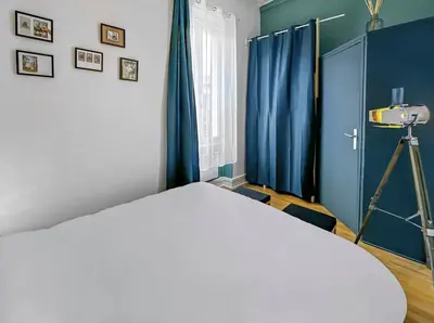 Un ou plusieurs lits dans un hébergement de l'établissement Superbe appartement au centre de POISSY