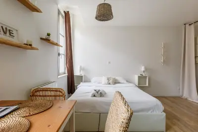 Un ou plusieurs lits dans un hébergement de l'établissement Nid Amour Cabane et Spa Privatif