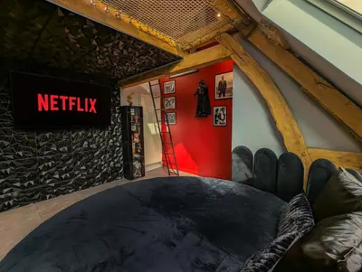 Coin salon dans l'établissement Cinéma Room romantique Studio de l'Etoile