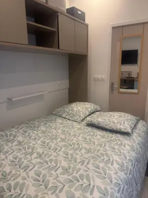 Un ou plusieurs lits dans un hébergement de l'établissement La douce escapade