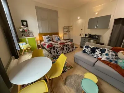 Coin salon dans l'établissement Cosy Bora Bora-Confort pour 4 personnes à Amiens