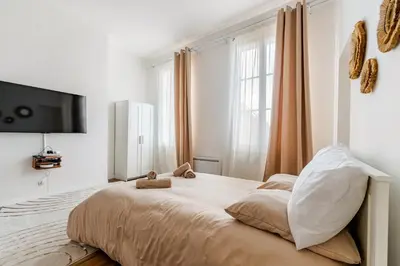 Un ou plusieurs lits dans un hébergement de l'établissement Charmant Studio Cosy - Hyper-Centre D'Elbeuf