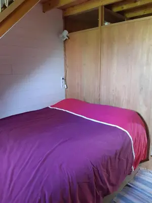 Un ou plusieurs lits dans un hébergement de l'établissement Studio du Clos Cadoux