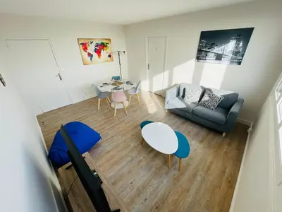 Coin salon dans l'établissement Évasion avec vue panoramique sur Rouen - 424