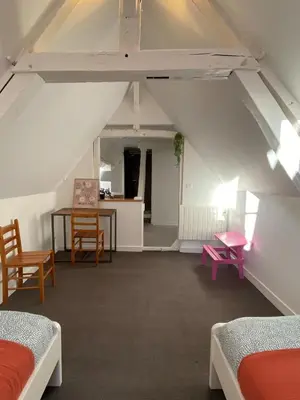 Un ou plusieurs lits dans un hébergement de l'établissement Sous les toits des Jacobins, 3 chambres, WiFi
