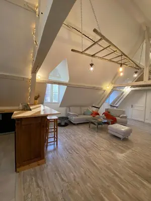 Coin salon dans l'établissement Sous les toits des Jacobins, 3 chambres, WiFi