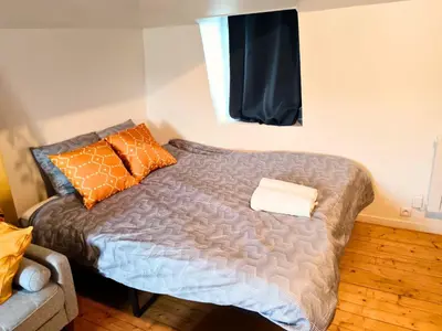 Un ou plusieurs lits dans un hébergement de l'établissement Studio Cosy Proche Gare Rouen Rive Droite