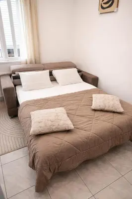 Un ou plusieurs lits dans un hébergement de l'établissement Duplex moderne et lumineux