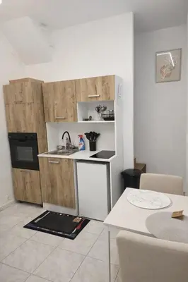 Cuisine ou kitchenette dans l'établissement Duplex moderne et lumineux