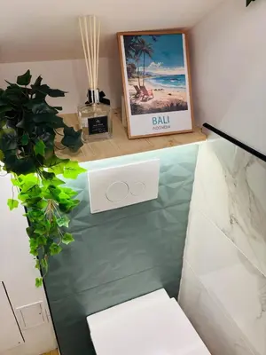Coin salon dans l'établissement Le Secret De Bali - Évasion en centre-ville