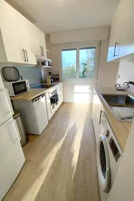 Cuisine ou kitchenette dans l'établissement Coloc studio standing mueble netflix gare