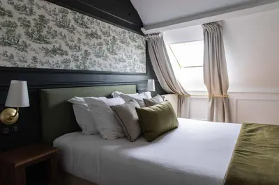 Un ou plusieurs lits dans un hébergement de l'établissement Château De La Bûcherie