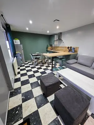 Coin salon dans l'établissement Gite 2-4 personnes