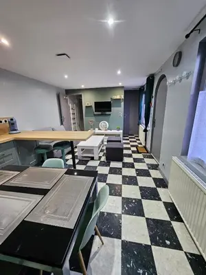 Coin salon dans l'établissement Gite 2-4 personnes