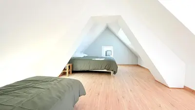 Un ou plusieurs lits dans un hébergement de l'établissement Maison cosy dans village de charme avec commerces