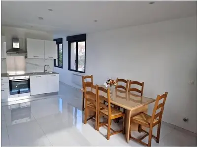 Cuisine ou kitchenette dans l'établissement Apartment G