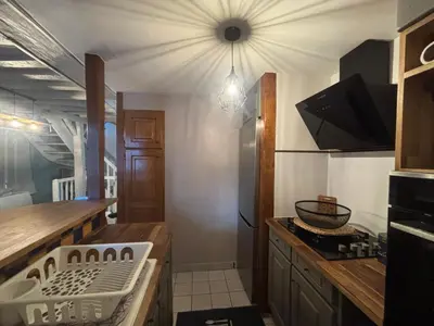 Cuisine ou kitchenette dans l'établissement Maison