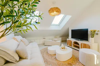 Télévision ou salle de divertissement dans l'établissement Maison Soleil Levant