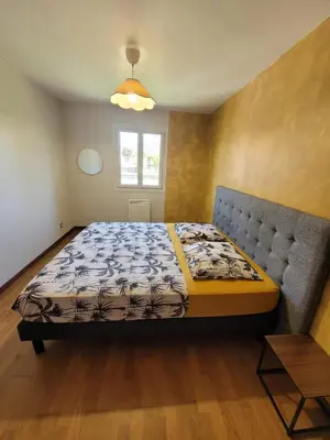 Un ou plusieurs lits dans un hébergement de l'établissement Family home in Gisors
