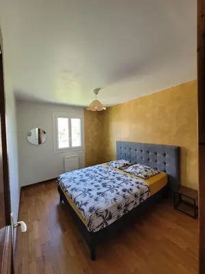 Un ou plusieurs lits dans un hébergement de l'établissement Family home in Gisors