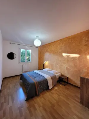 Un ou plusieurs lits dans un hébergement de l'établissement Family home in Gisors