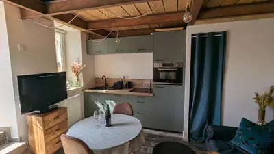 Cuisine ou kitchenette dans l'établissement Maison Nymphéas