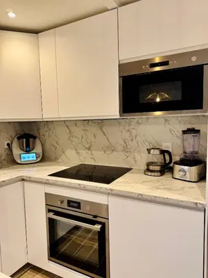 Cuisine ou kitchenette dans l'établissement Cozy new home & garden - Close to Paris- Parking