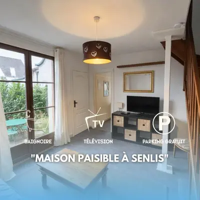 Télévision ou salle de divertissement dans l'établissement Maison paisible à Senlis