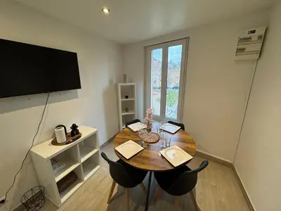 Télévision ou salle de divertissement dans l'établissement L'Escapade Amiénoise