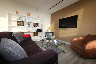 Télévision ou salle de divertissement dans l'établissement Le 360 TOUR PERRET 19eme PANORAMA 4 ETOILES