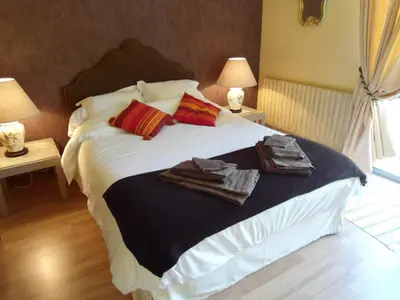 Un ou plusieurs lits dans un hébergement de l'établissement B&B La Maison de L'Aubette