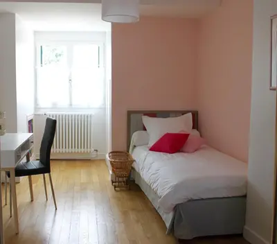 Un ou plusieurs lits dans un hébergement de l'établissement Au Coeur De Beauvais
