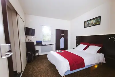 Un ou plusieurs lits dans un hébergement de l'établissement The Originals Access, Halt'Hotel, Clermont Agnetz