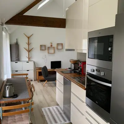 Cuisine ou kitchenette dans l'établissement La Maisonnette de Senlis