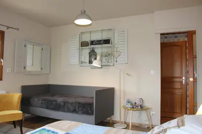 Coin salon dans l'établissement Chambre D'hotes Le Clos Fleuri
