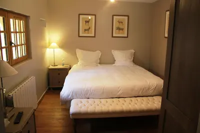 Un ou plusieurs lits dans un hébergement de l'établissement Hôtel La Licorne & Spa