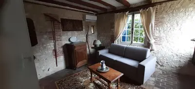 Coin salon dans l'établissement Le Four À Pain