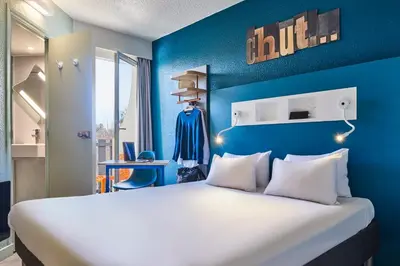 Un ou plusieurs lits dans un hébergement de l'établissement ibis budget Saint-Ouen-l'Aumône
