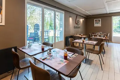 Restaurant ou autre lieu de restauration dans l'établissement Campanile Rouen Sud - Zénith - Parc Expo
