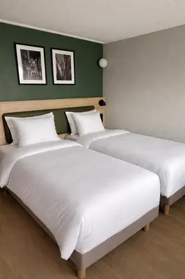 Un ou plusieurs lits dans un hébergement de l'établissement Campanile Rouen Nord - Mont-Saint-Aignan