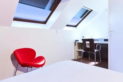 Un ou plusieurs lits dans un hébergement de l'établissement KYRIAD ROUEN NORD - Mont Saint Aignan