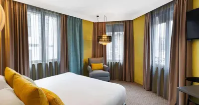 Un ou plusieurs lits dans un hébergement de l'établissement Best Western Plus Hotel de Dieppe 1880