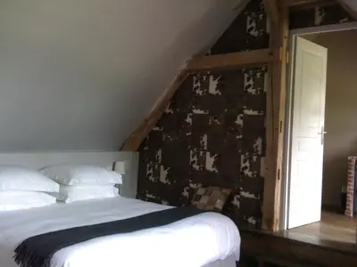 Un ou plusieurs lits dans un hébergement de l'établissement Clos Masure hôtel de campagne