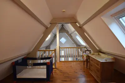 Un ou plusieurs lits dans un hébergement de l'établissement Ets Levillain - Hôtel Les Calètes
