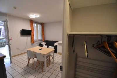 Télévision ou salle de divertissement dans l'établissement Ets Levillain - Hôtel Les Calètes