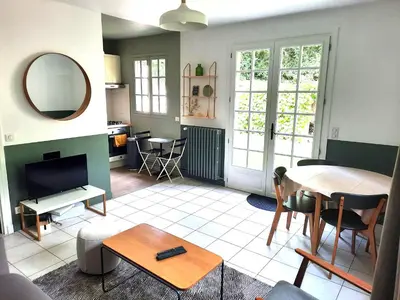 Coin salon dans l'établissement Magnolia Cottage