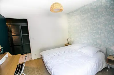 Un ou plusieurs lits dans un hébergement de l'établissement Magnolia Cottage