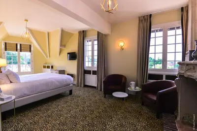 Un ou plusieurs lits dans un hébergement de l'établissement Hostellerie Saint Pierre